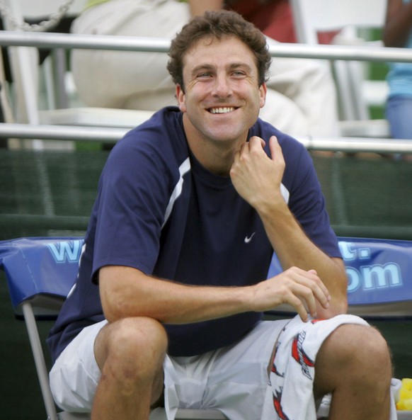 FILE - In this July 23, 2008 file photo, Justin Gimelstob, then a member of Kastles&#039; World Team Tennis, smiles during a match in Washington. Now a tennis broadcaster and coach, Gimelstob faces a  ...