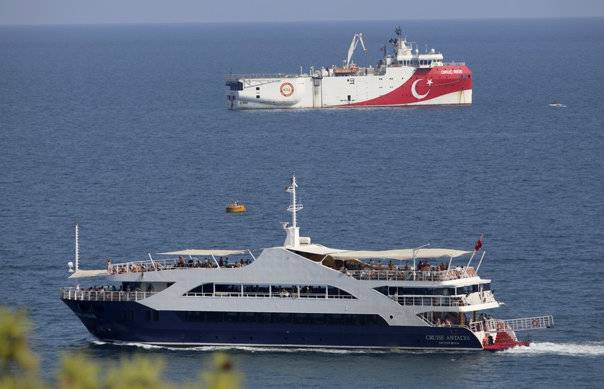 Turkey&#039;s research vessel, Oruc Reis, rear, anchored off the coast of Antalya on the Mediterranean, Turkey, Sunday, Sept. 13, 2020. Greece&#039;s Prime Minister Kyriakos Mitsotakis welcomed the re ...