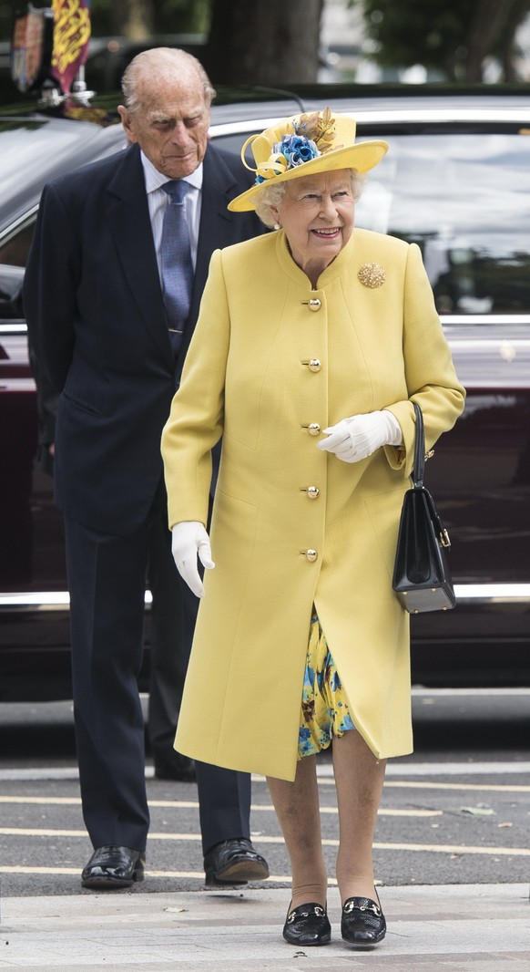 epa06084723 Britain&#039;s Queen Elizabeth II (R) and Prince Philip (L) Duke of Edinburgh arrive to officially open the new headquarters of New Scotland Yard, Central London, Britain, 13 July 2017. EP ...