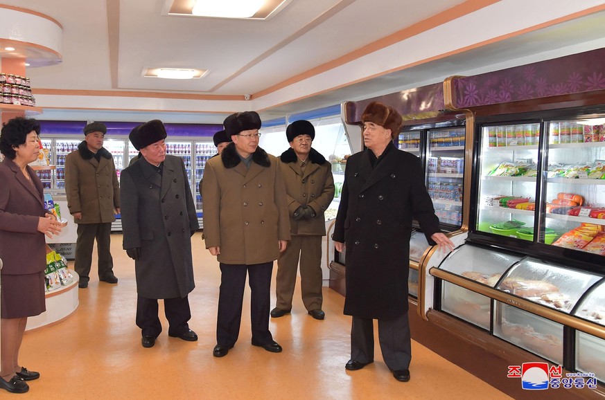 epa08040418 A photo released by the official North Korean Central News Agency (KCNA) shows North Korea&#039;s party and government officials inspecting stuffed fridges in a supermarket during a ribbon ...