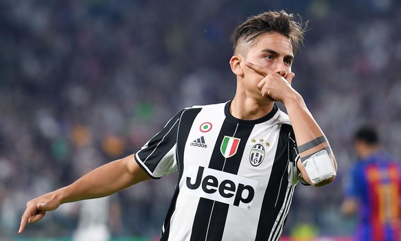 Juventus&#039; Paulo Dybala celebrates after scoring during a Champions League, quarterfinal, first-leg soccer match between Juventus and Barcelona, at the Juventus Stdium in Turin, Italy, Tuesday, Ap ...