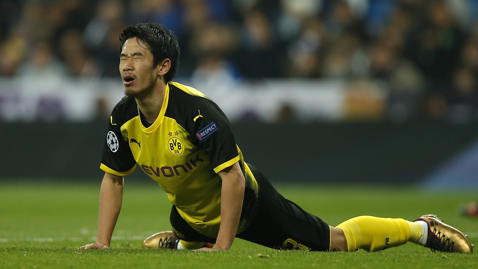 Dortmund&#039;s Shinji Kagawa reacts disappointed during the Champions League Group H soccer match between Real Madrid and Borussia Dortmund at the Santiago Bernabeu stadium in Madrid, Spain, Wednesda ...