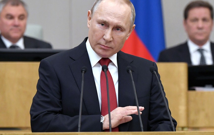 Russian President Vladimir Putin speaks during a session prior to voting for constitutional amendments at the State Duma, the Lower House of the Russian Parliament in Moscow, Russia, Tuesday, March 10 ...