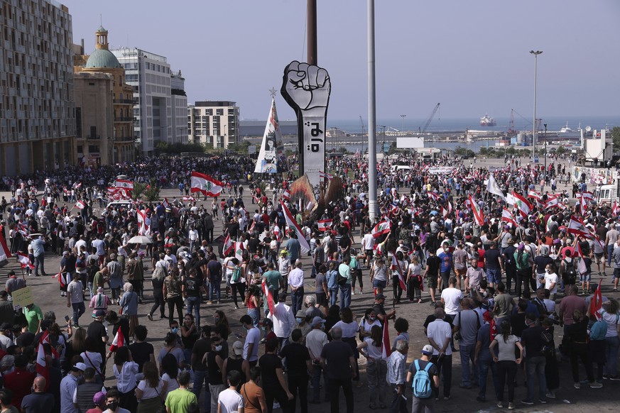 Anti-government protesters gather at Martyrs Square during ongoing protests against the Lebanese government, in downtown Beirut, Lebanon, Saturday, June 6, 2020. Hundreds of Lebanese demonstrators gat ...