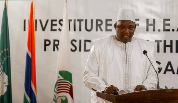 The swearing in ceremony during the inauguration of Gambia President Adama Barrow at the Gambian embassy in Dakar, Senegal, is seen in this handout photo provided by Office of the Senegal Presidency,  ...