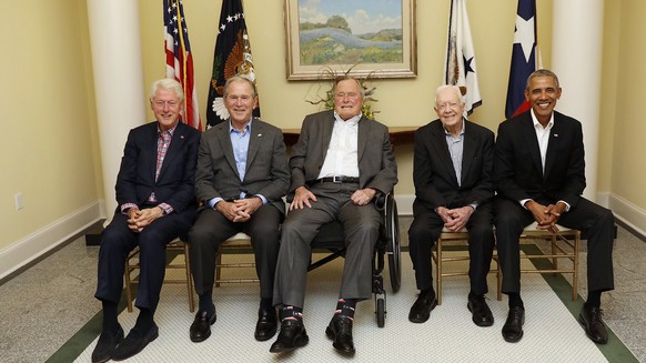 epa06283400 A handout photo made available by One America Appeal via the George W. Bush Presidential Library shows five former US Presidents (L-R) Bill Clinton, George W. Bush, George H.W. Bush, Jimmy ...