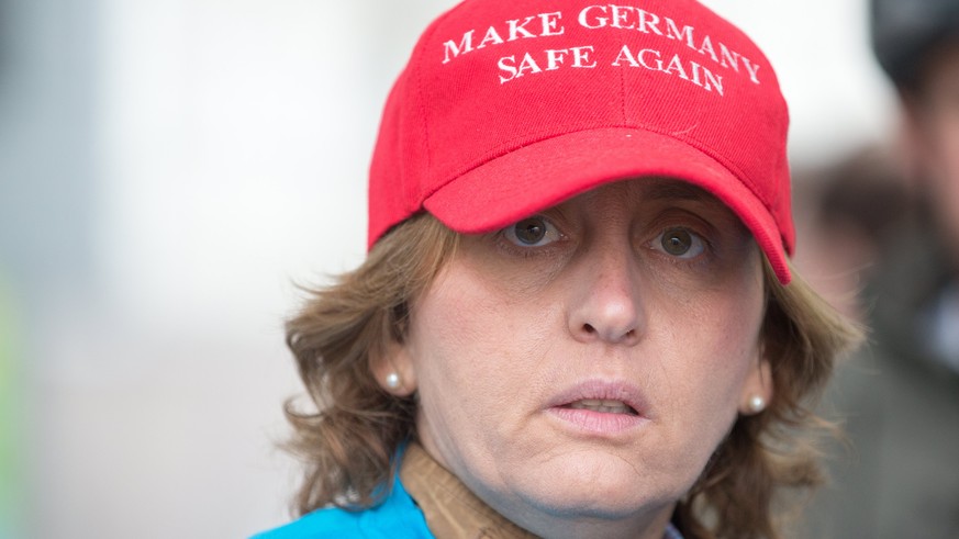 epa06194272 Beatrix von Storch, German Member of European Parliament of &#039;Alternative for Germany&#039; (AfD) party wears a red cap with the inscription &#039;Make Germany safe again&#039; prior t ...