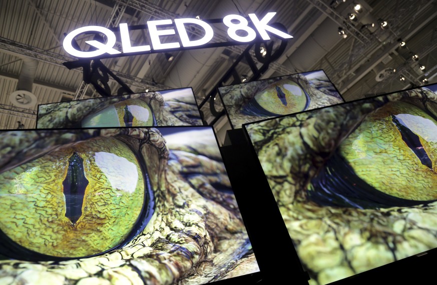 QLED 8K television screens are presented at the Samsung booth at the IFA 2019 tech fair in Berlin, Germany, Friday, Sept. 6, 2019. The IFA takes place in Berlin from Sept. 6 until Sept. 11, 2019. (AP  ...