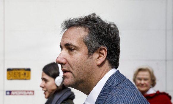 epa06664206 Attorney Michael Cohen, US President Donald J. Trump&#039;s long-time personal attorney, walks from his hotel to his apartment in New York, New York, USA, 12 April 2018. Cohen&#039;s hotel ...