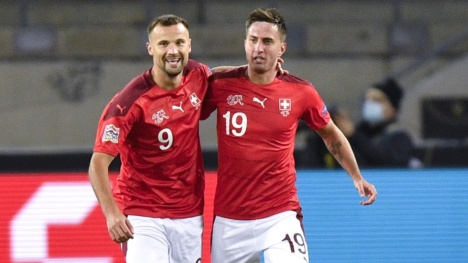 Switzerland&#039;s Mario Gavranovic is congratulated by teammate Haris Seferovic, left, after scoring his team&#039;s first goal during the UEFA Nations League soccer match between Germany and Switzer ...