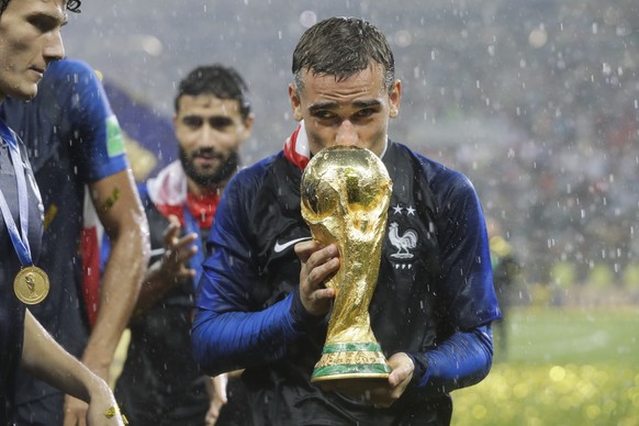 France&#039;s Antoine Griezmann kisses the trophy after the final match between France and Croatia at the 2018 soccer World Cup in the Luzhniki Stadium in Moscow, Russia, Sunday, July 15, 2018. (AP Ph ...