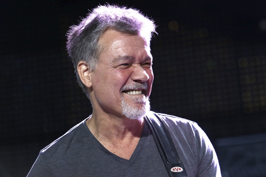 FILE - Eddie Van Halen of Van Halen performs on Aug. 13, 2015, in Wantagh, N.Y. Van Halen, who had battled cancer, died Tuesday, Oct. 6, 2020. He was 65. (Photo by Greg Allen/Invision/AP, File)
Eddie  ...