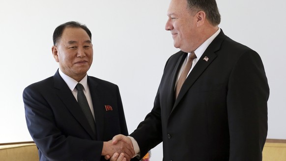 Kim Yong Chol, former North Korean military intelligence chief and one of Kim Jong Un&#039;s closest aides, left, and U.S. Secretary of State Mike Pompeo pose for a picture before a meeting, Thursday, ...