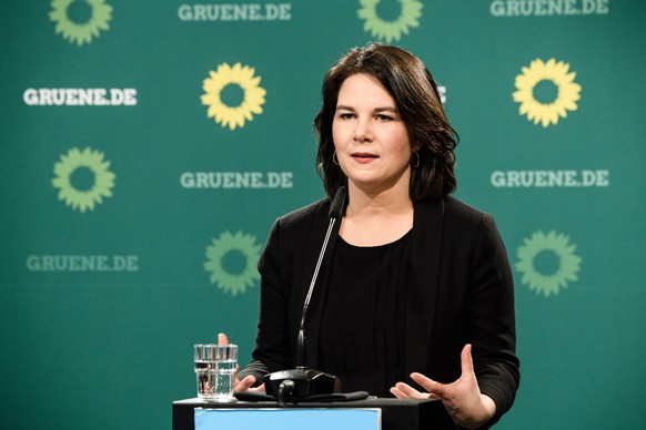 epa09104880 Green party (Die Gruenen) co-chairwoman Annalena Baerbock attends a press conference in Berlin, Germany, 29 March 2021. The Greens are expected to decide between Easter and Pentecost on a  ...