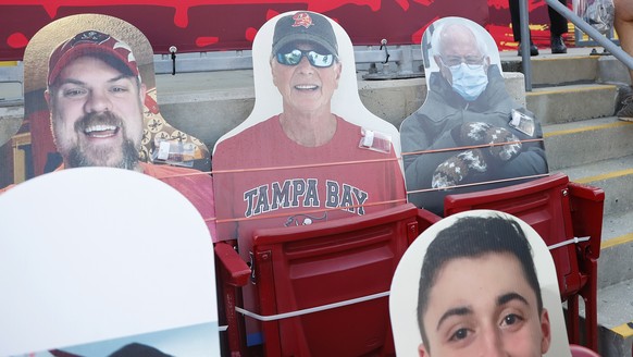 epa08994724 A cutout of Vermont Senator Bernie Sanders (C) as fans begin to arrive amidst cutouts of fans in Raymond James Stadium hours before the AFC Champion Kansas City Chiefs play the NFC Champio ...