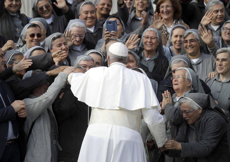 Pope Francis greets a group of nuns in St. Peter&#039;s Square at the Vatican at the end of his weekly general audience, Wednesday, Oct. 31, 2018. (AP Photo/Alessandra Tarantino)