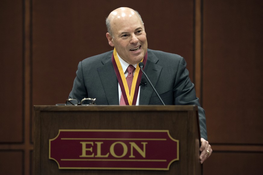 FILE - In this March 1, 2017, file photo, then Elon Trustee Louis DeJoy is honored with Elon&#039;s Medal for Entrepreneurial Leadership in Elon. N.C. U.S. Sen. Joe Manchin and union officials say the ...
