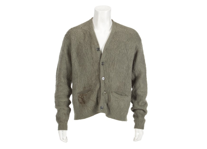 This image released by Julien&#039;s Auctions shows an olive green cardigan sweater worn by Nirvana frontman Kurt Cobain during Nirvana&#039;s MTV&#039;s &quot;Unplugged&quot; performance. The sweater ...