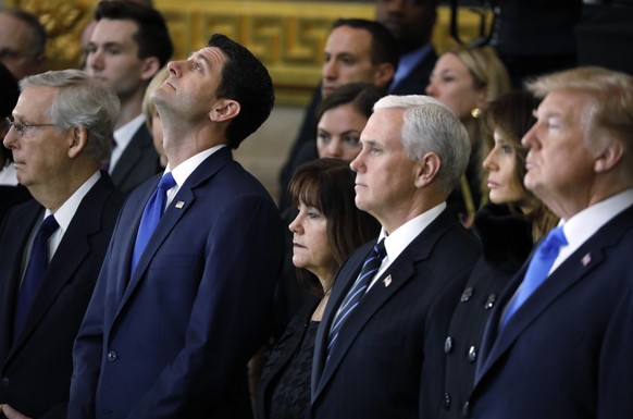 From left, Senate Majority Leader Mitch McConnell of Kentucky, House Speaker Paul Ryan of Wisconsin, Karen Pence, Vice President Mike Pence, first lady Melania Trump and President Donald Trump, attend ...