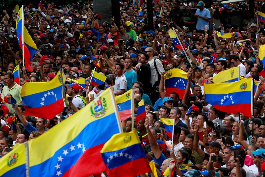 epa07315371 (FILE) - Opponents of Chavism demonstrate against the Government of President Nicolas Maduro in Caracas, Venezuela, 23 January 2019 (reissued 24 January 2019). Venezuela has fallen into a  ...
