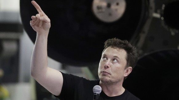 SpaceX founder and chief executive Elon Musk speaks after announcing Japanese billionaire Yusaku Maezawa as the first private passenger on a trip around the moon, Monday, Sept. 17, 2018, in Hawthorne, ...