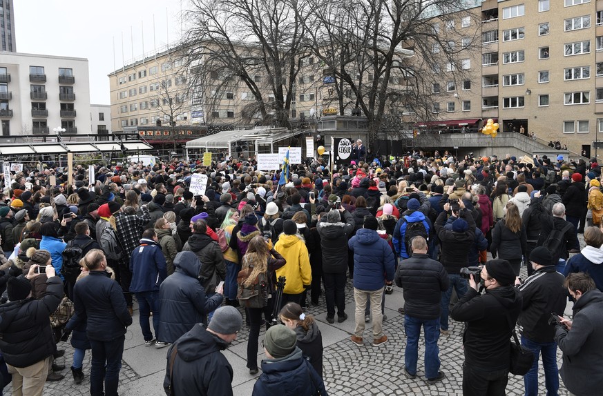 Anti-lockdown protesters demonstrate against coronavirus restrictions in Stockholm Saturday March 6, 2021. The protest was disbanded by police due to lack of permit for the public gathering. (Henrik M ...