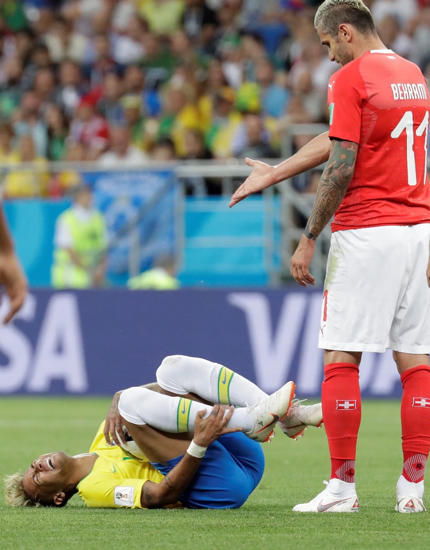 epa06816836 Brazilian forward Neymar (bottom) reacts during the FIFA World Cup 2018 Group E soccer match between Brazil and Switzerland, in Rostov-On-Don, Russia, 17 June 2018. 

(RESTRICTIONS APPLY ...