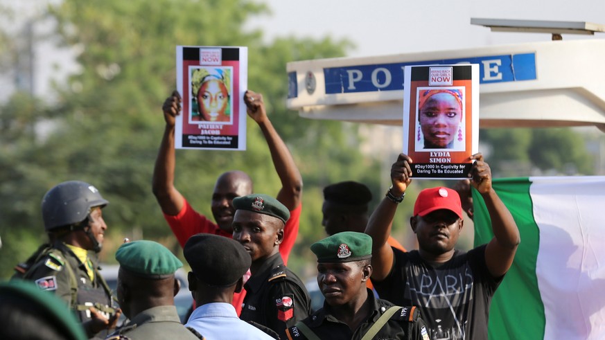 Police disrupt a rally by the #BringBackOurGirls campaign, which is protesting in Nigeria&#039;s capital Abuja to mark 1,000 days since over 200 schoolgirls were kidnapped from their secondary school  ...