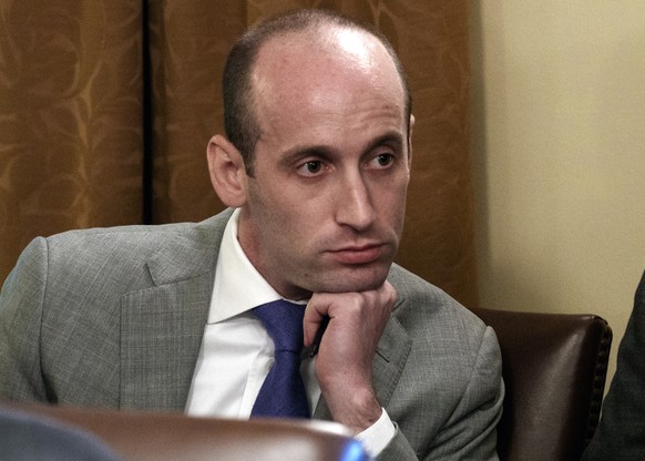 FILE - In this June 21, 2018 file photo, White House senior adviser Stephen Miller listens as President Donald Trump speaks during a cabinet meeting at the White House in Washington. A California scho ...