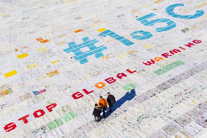 A giant postcard of approximately 2500 square meters (50m by 50m)made of contributions from over 125&#039;000 individual postcards containing messages aiming to fight climate change and global warming ...