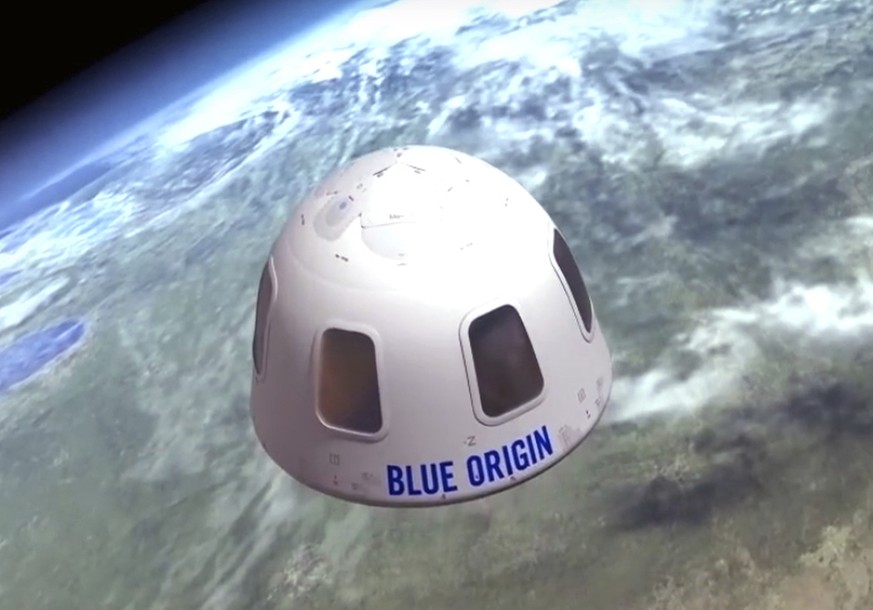 FILE - This undated illustration provided by Blue Origin shows the capsule that the company aims to take tourists into space. Jeff Bezos&#039; rocket company is already calling its future clients &quo ...