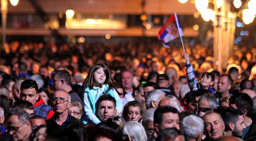 epa07461273 Thousands of citizens take part in the ceremony marking the 20th anniversary of the NATO bombing campaign of the former Yugoslavia in the center of Nis, Serbia, 24 March 2019. NATO started ...