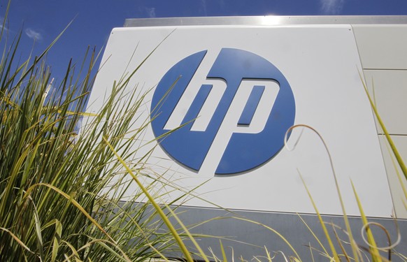 FILE - In this Aug. 21, 2012, file photo, the Hewlett-Packard Co. logo is seen outside the company&#039;s headquarters in Palo Alto, Calif. Hewlett-Packard Co. reports quarterly financial results afte ...