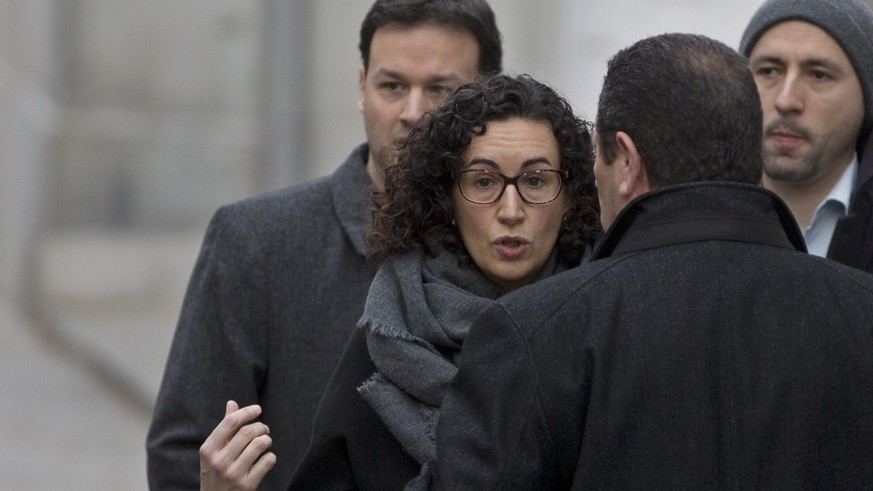 FILE - In this Feb. 19, 2018 file photo, Catalan separatist politician and left-republican ERC party&#039;s Marta Rovira arrives at the Supreme court for questioning in Madrid, Spain. Marta Rovira, a  ...