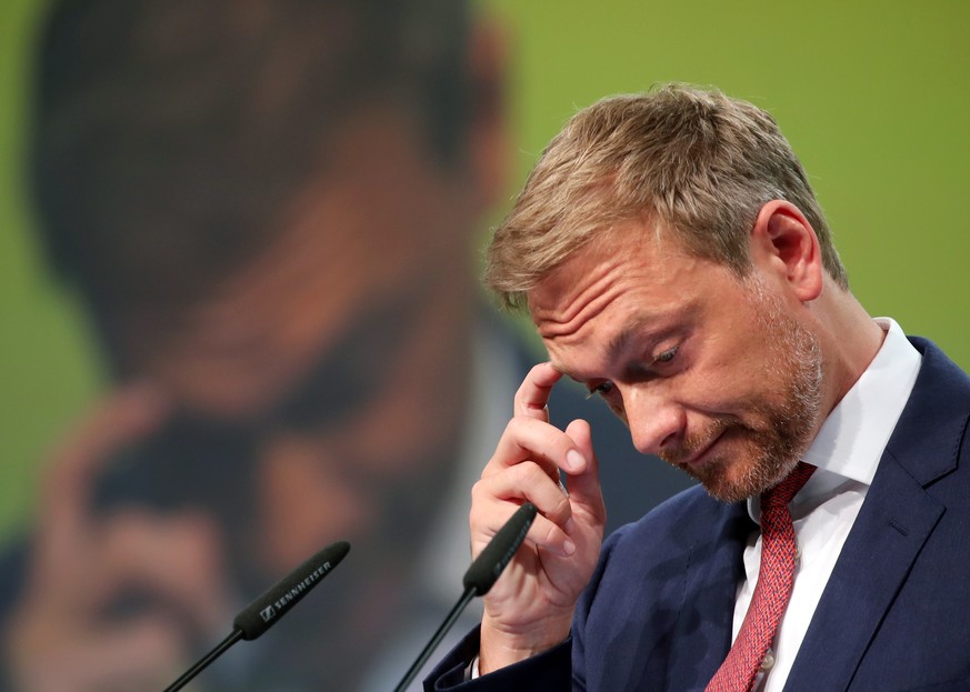 epa06730177 The leader of the Free Democratic Party (FDP), Christian Lindner, gestures during his speech in the FDP party conference in Berlin, Germany, 12 May 2018. Delegates will discuss and set the ...