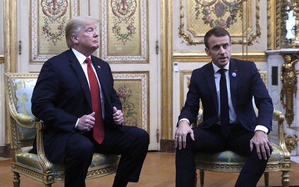 President Donald Trump meets with French President Emmanuel Macron inside the Elysee Palace in Paris Saturday Nov. 10, 2018. Trump is joining other world leaders at centennial commemorations in Paris  ...
