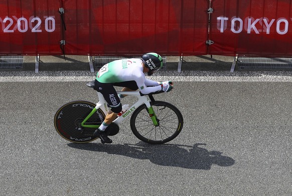 Azzedine Lagab of Algeria competes during the men&#039;s cycling individual time trial at the 2020 Summer Olympics, Wednesday, July 28, 2021, in Oyama, Japan. (Tim de Waele/Pool Photo via AP)