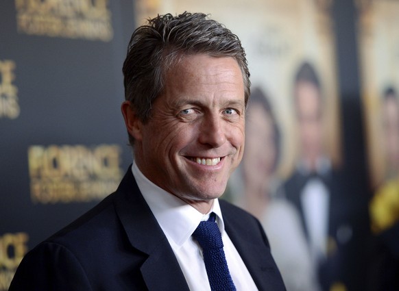 FILE - This Aug. 9, 2016 file photo shows actor Hugh Grant at the premiere of &quot;Florence Foster Jenkins&quot; in New York. Grant will be among several cast members from the 2003 film, &quot;Love A ...