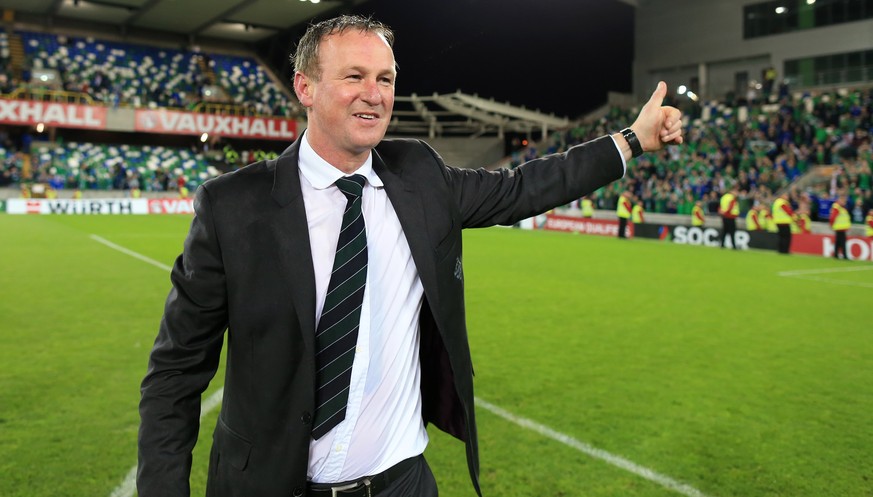 8th October 2015 - European Championship Qualifying (Group F) - Northern Ireland v Greece - Northern Ireland manager Michael O&#039;Neill gives the thumbs up to the fans as he celebrates victory and q ...