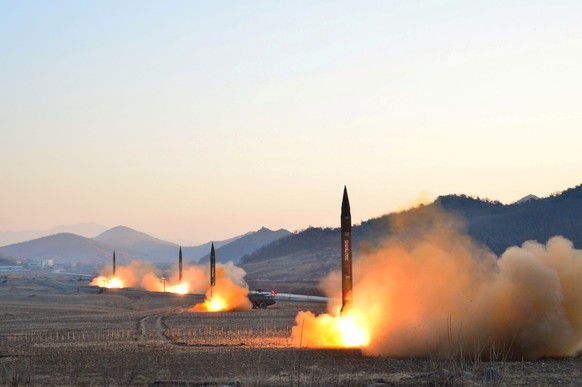 FILE PHOTO: North Korean leader Kim Jong Un supervised a ballistic rocket launching drill of Hwasong artillery units of the Strategic Force of the KPA on the spot in this undated photo released by Nor ...