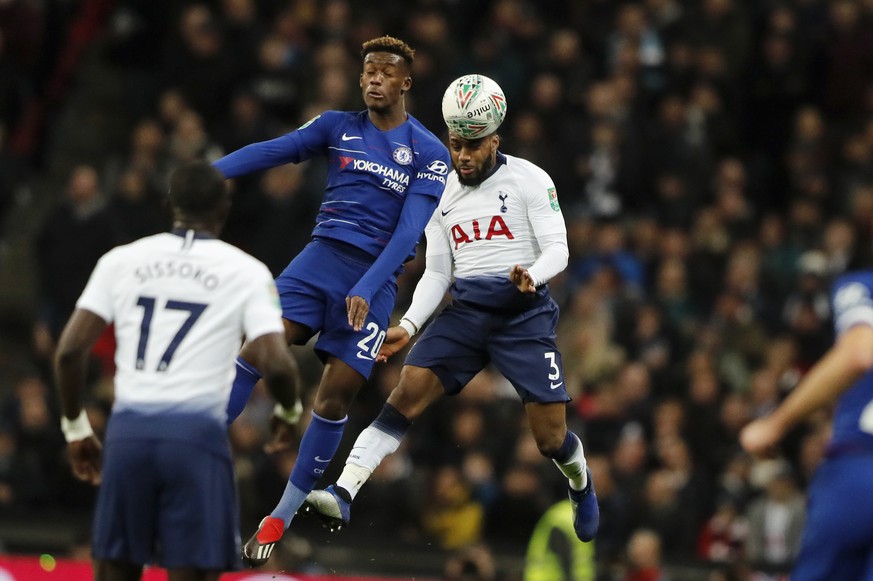 Chelsea&#039;s Callum Hudson-Odoi, left, and Tottenham&#039;s Danny Rose challenge for the ball during the English League Cup semifinal first leg soccer match between Tottenham Hotspur and Chelsea at  ...