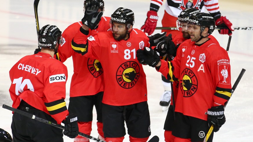 SCB&#039;s Thomas Ruefenacht, center, celebrates his goal with team mates during the Champions Hockey League group F match between Switzerland&#039;s SC Bern against Czech Republic&#039;s Mountfield H ...