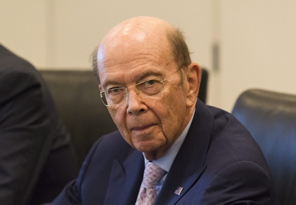epa05676012 Commerce Secretary nominee Wilbur Ross is seen at a meeting of technology leaders in the Trump Organization conference room at Trump Tower in New York, New york, USA, 14 December 2016. EPA ...