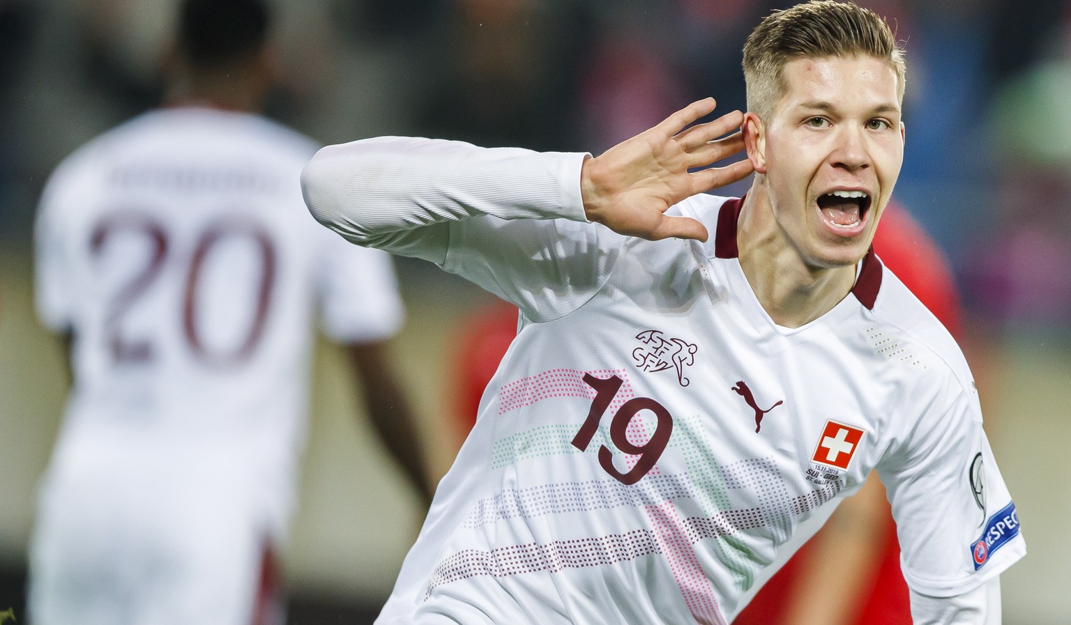 epa08000632 Switzerland&#039;s midfielder Cedric Itten celebrates scoring the opening goal during the UEFA Euro 2020 qualifying Group D soccer match between Switzerland and Georgia at the Kybunpark st ...