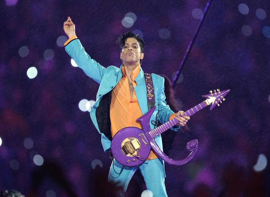 FILE - In this Feb. 4, 2007, file photo, Prince performs during the halftime show at the Super Bowl XLI football game at Dolphin Stadium in Miami. The Grammy Awards announced Wednesday Feb. 8, 2017, t ...