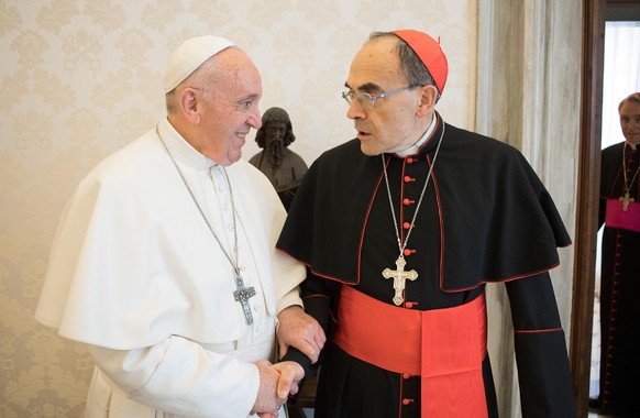 epa07446889 An handout image released by Vatican Media shows Pope Francis (L) receiving Cardinal Philippe Barbarin (R), Archbishop of Lyon (France) in Vatican City, 18 March 2019. Cardinal Philippe Ba ...