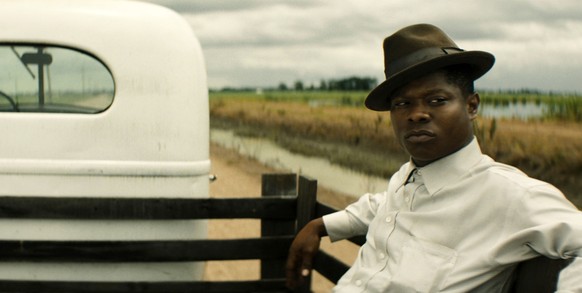 This image released by Netflix shows Jason Mitchell in a scene from &quot;Mudbound.&quot; (Netflix via AP)