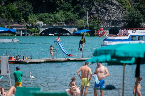 People enjoy the sunny weather after the reopening of the Lido di Lugano seaside resort and open-air swimming pool will reopen on Saturday, 20 June 2020, after the coronavirus crisis, in Lugano, Switz ...