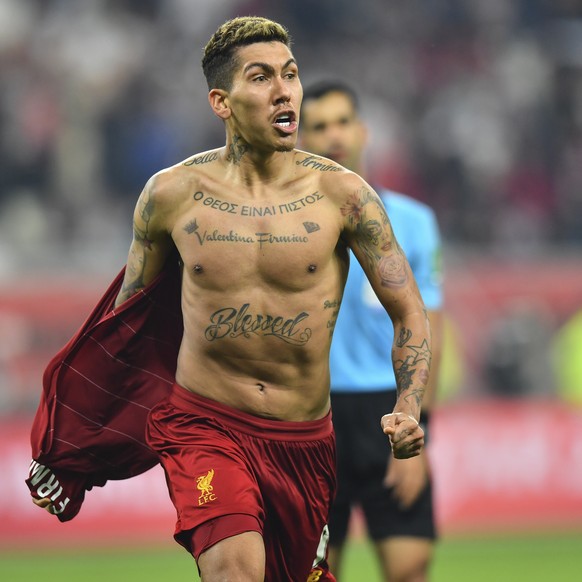 epa08085868 Roberto Firmino of Liverpool celebrates after scoring a goal during the FIFA Club World Cup 2019 final soccer match between Liverpool FC and CR Flamengo in Doha, Qatar 21 December 2019. EP ...