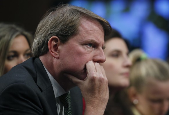 FILE - In this Sept. 6, 2018, file photo, White House counsel Don McGahn listens as President Donald Trump&#039;s Supreme Court nominee, Brett Kavanaugh testifies before the Senate Judiciary Committee ...